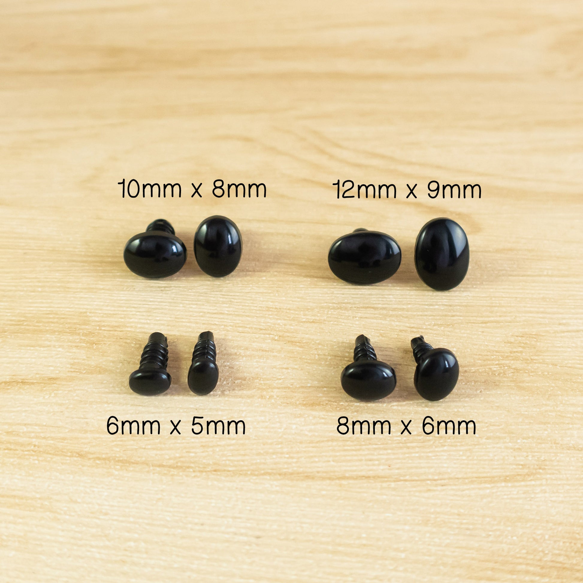 Various sizes of black oval safety eyes and noses for stuffed toys