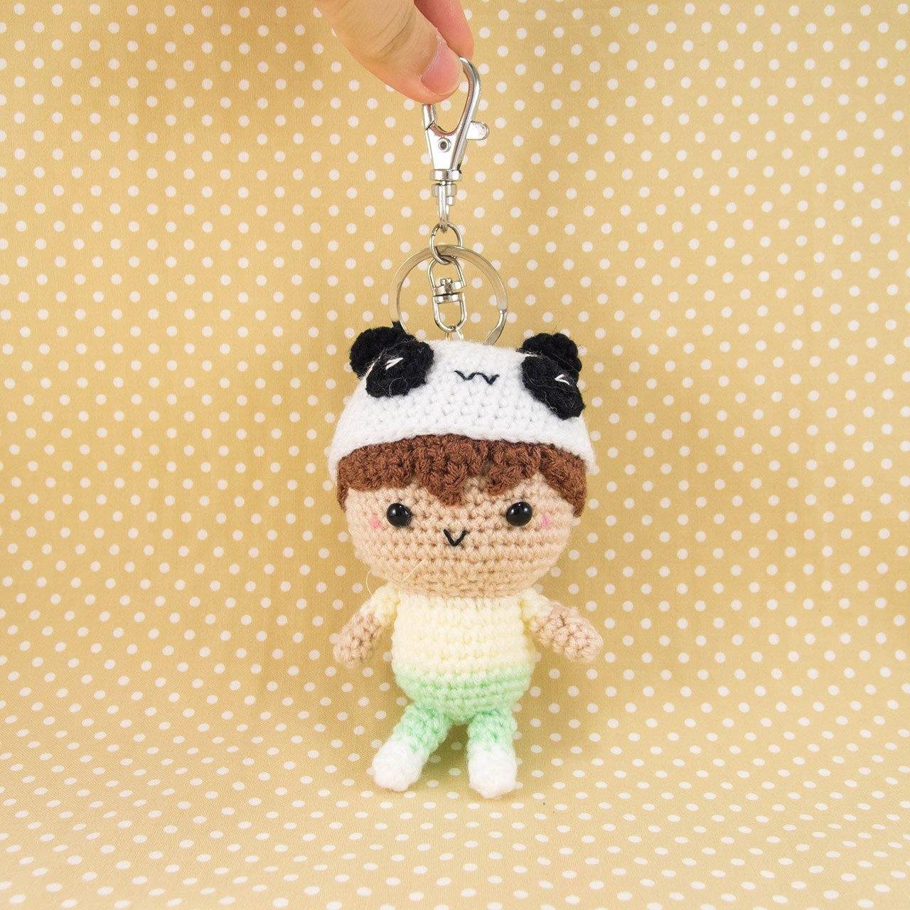Boy wearing Panda Hat Doll with Key Chain Attached