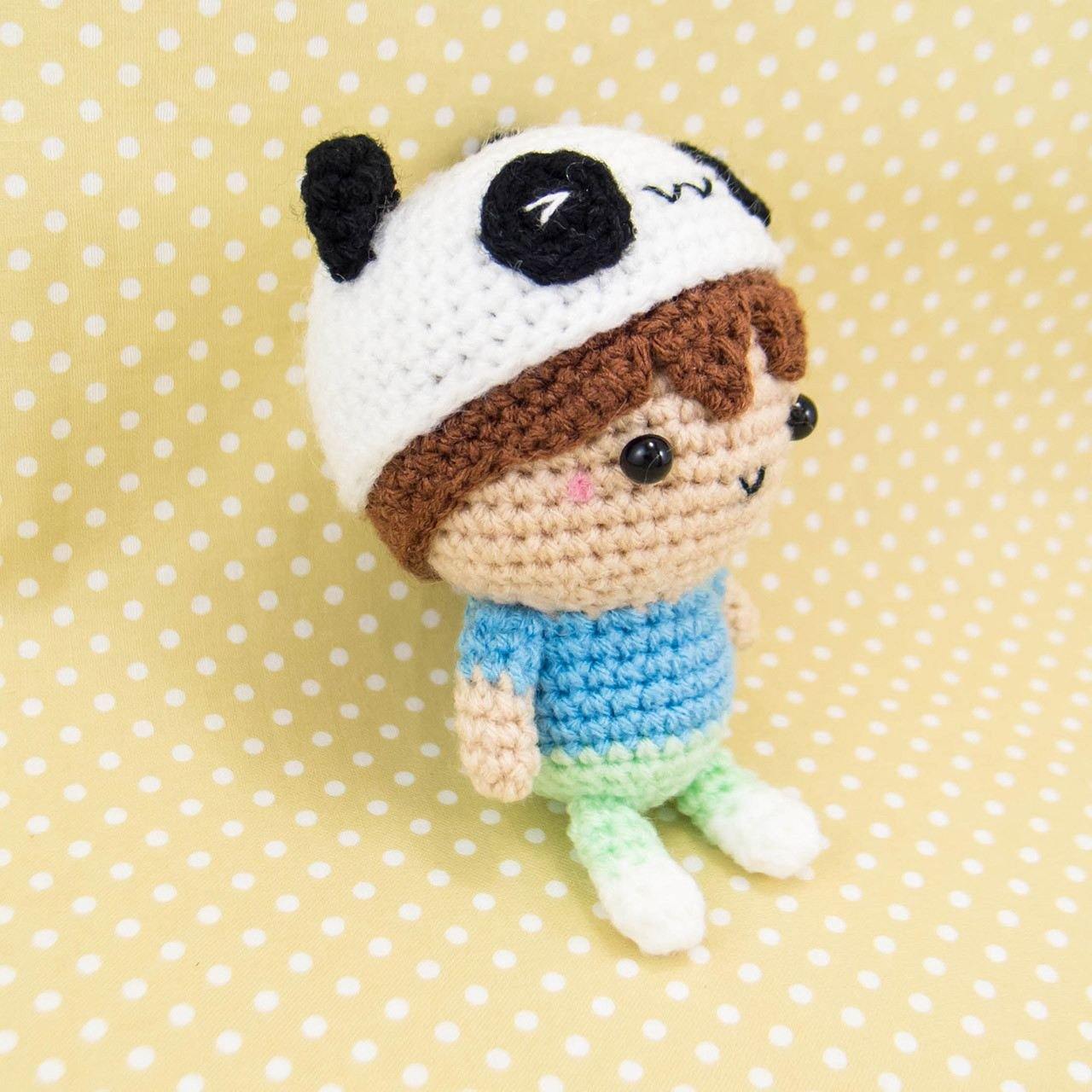 Plush Boy wearing Panda Hat
