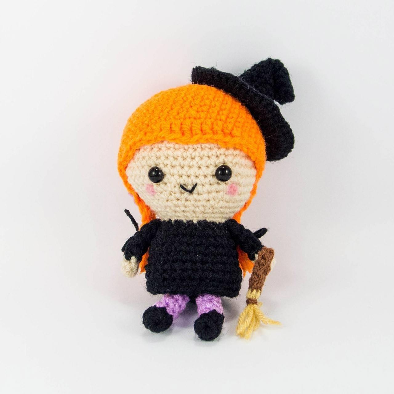 Witch crochet toy with orange hair